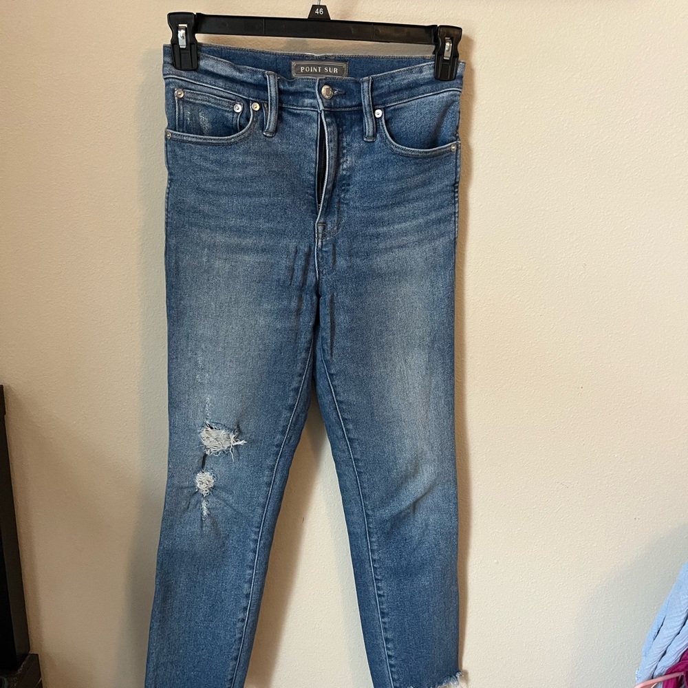 Blue Skinny Jeans with Distressed Details